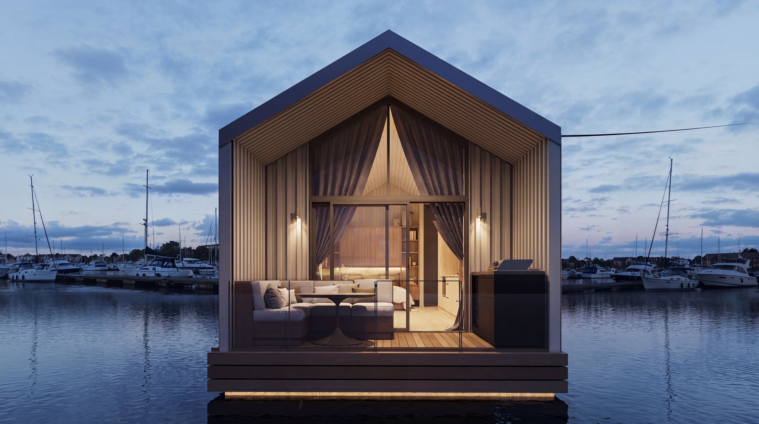 Evening render of the Boathouse studio with warm interior light reflecting on the water