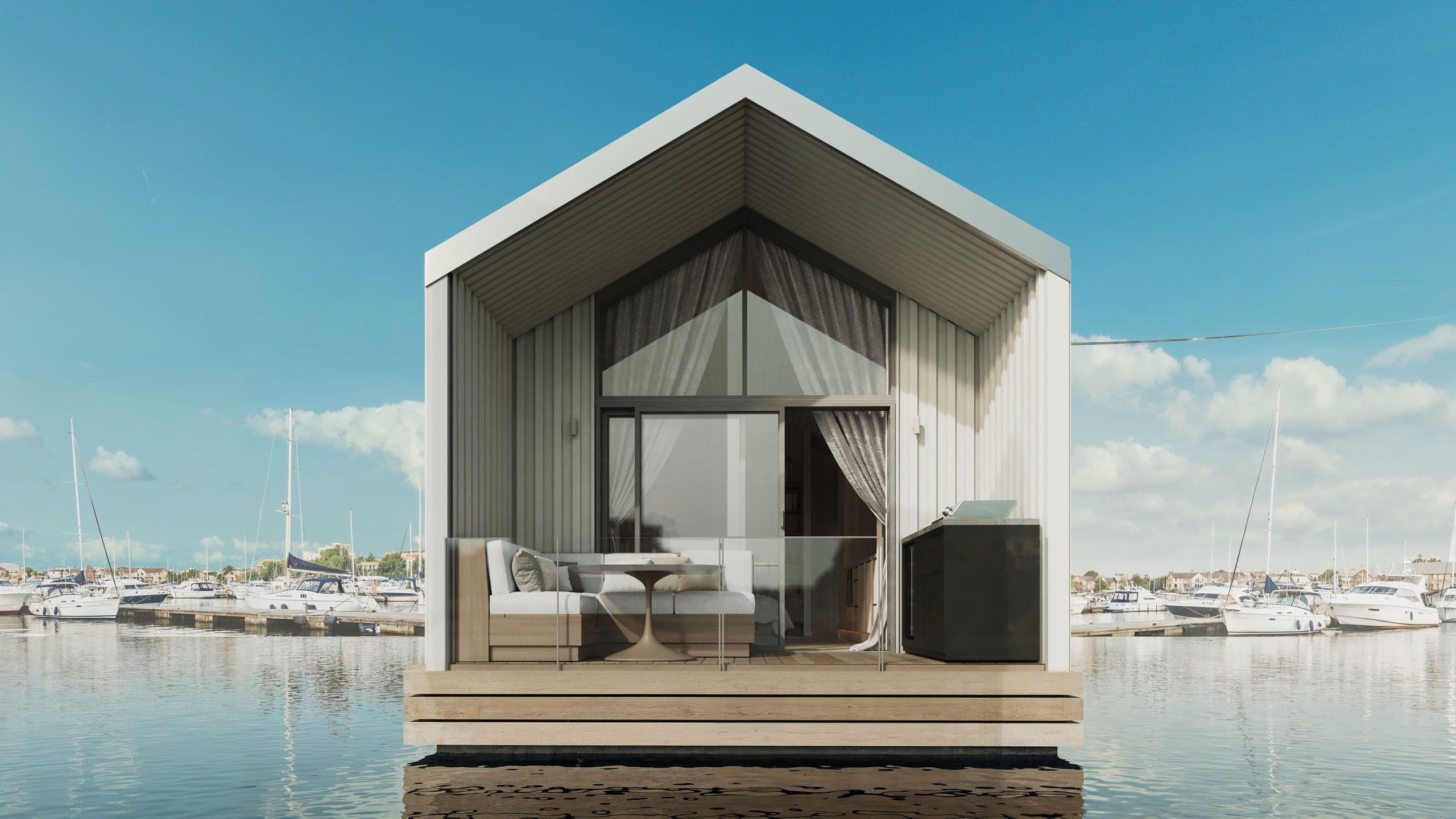Front render of the gabled Boathouse studio with full-height glazing and a timber deck