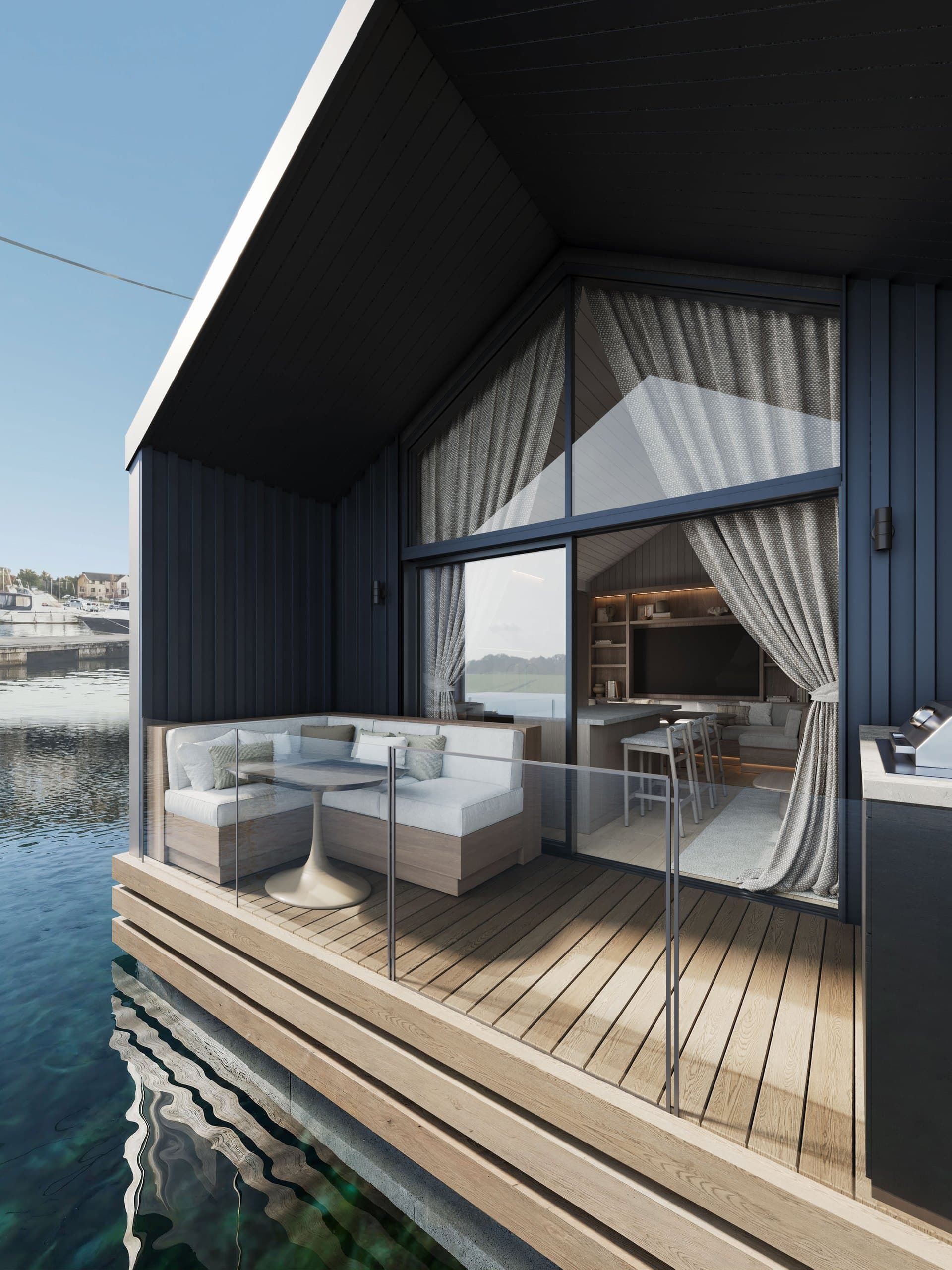Render of the two-bedroom Boathouse deck with a sofa facing the marina