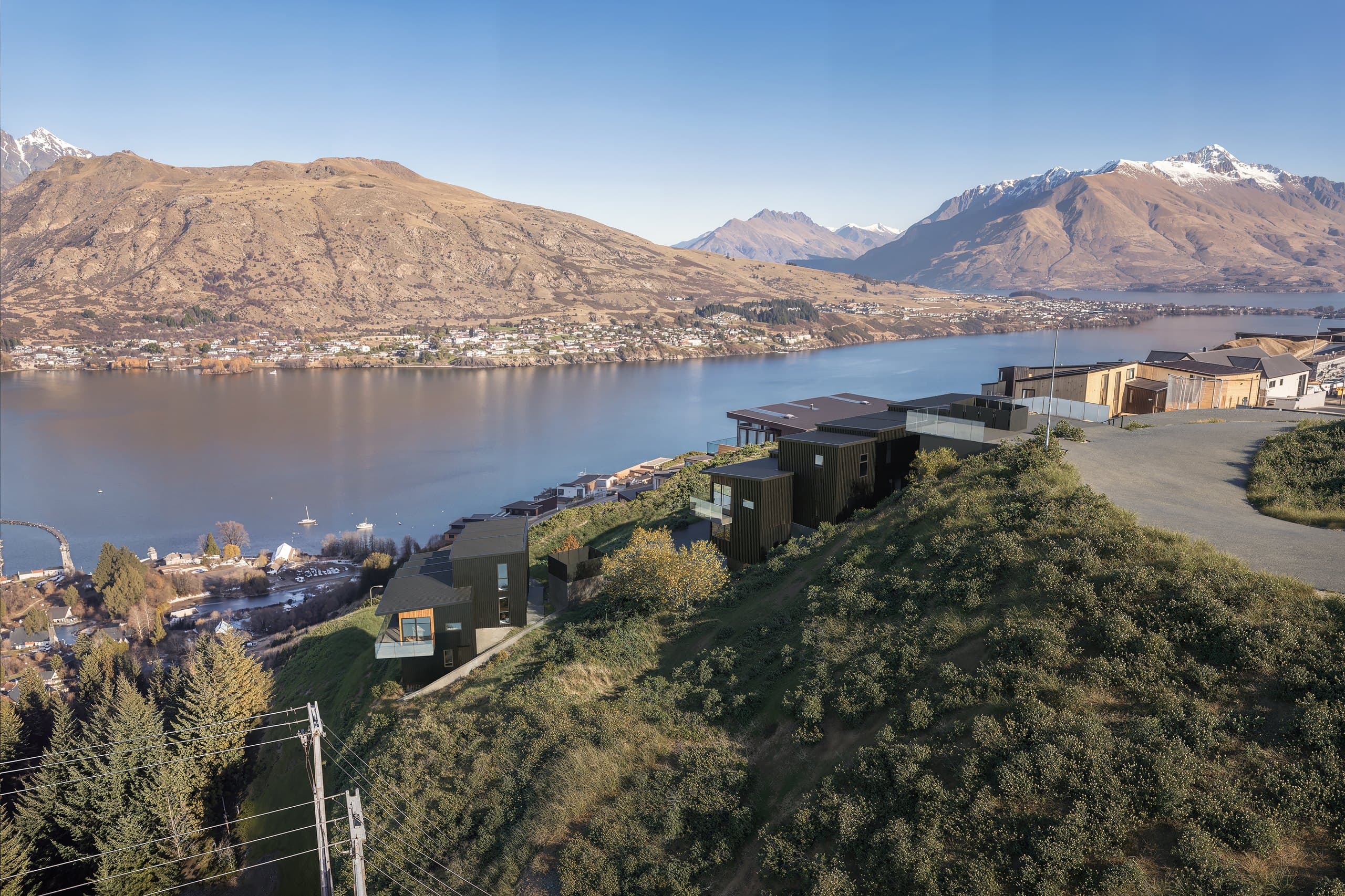 Photorealistic aerial render of the Middleton hillside homes with Lake Whakatipu and Queenstown behind