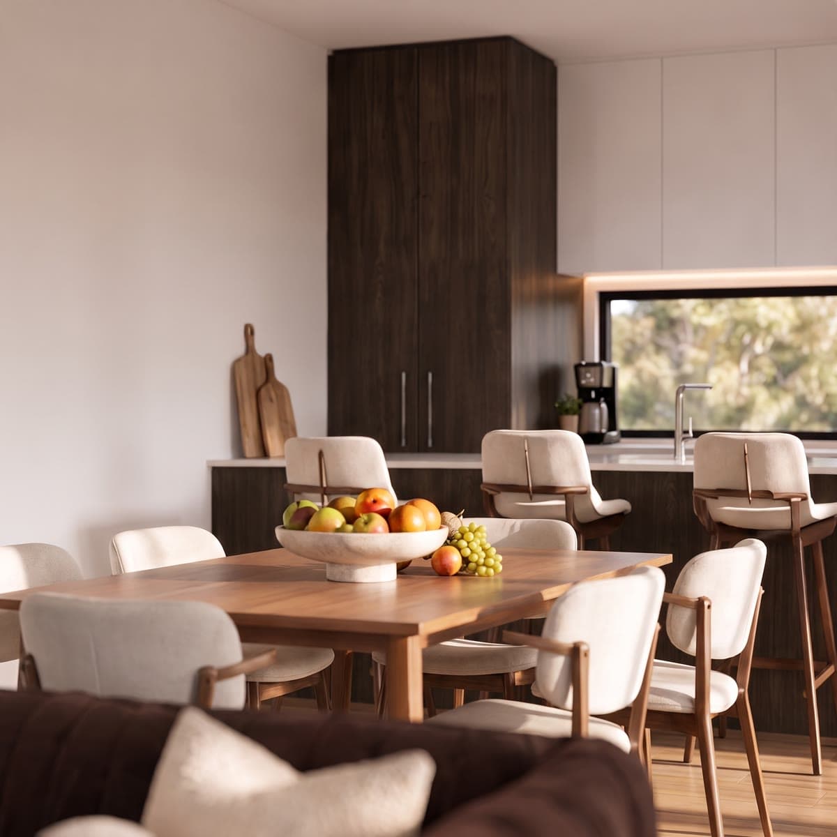 Close-up render of the Rogers Street dining table and kitchen island stools in warm afternoon light
