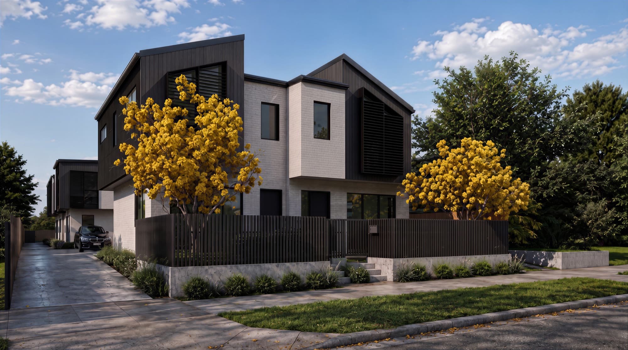 Photorealistic street-corner render of the Springleigh townhouse row in Mount Albert