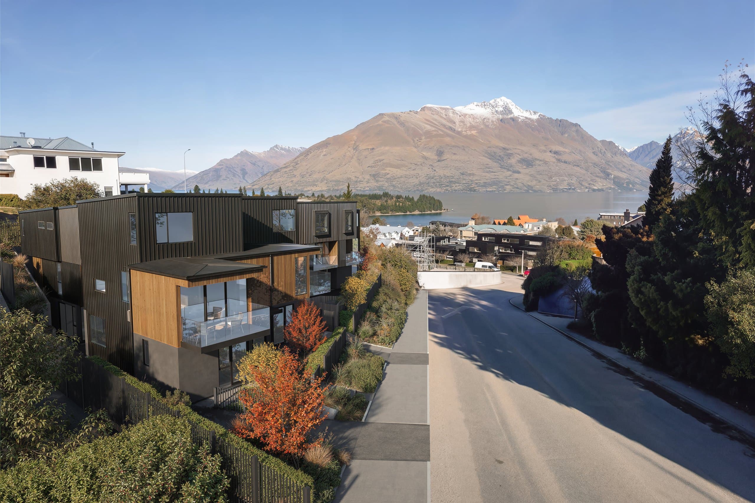 Photorealistic render looking down York Street past the residences toward Lake Whakatipu and the mountains