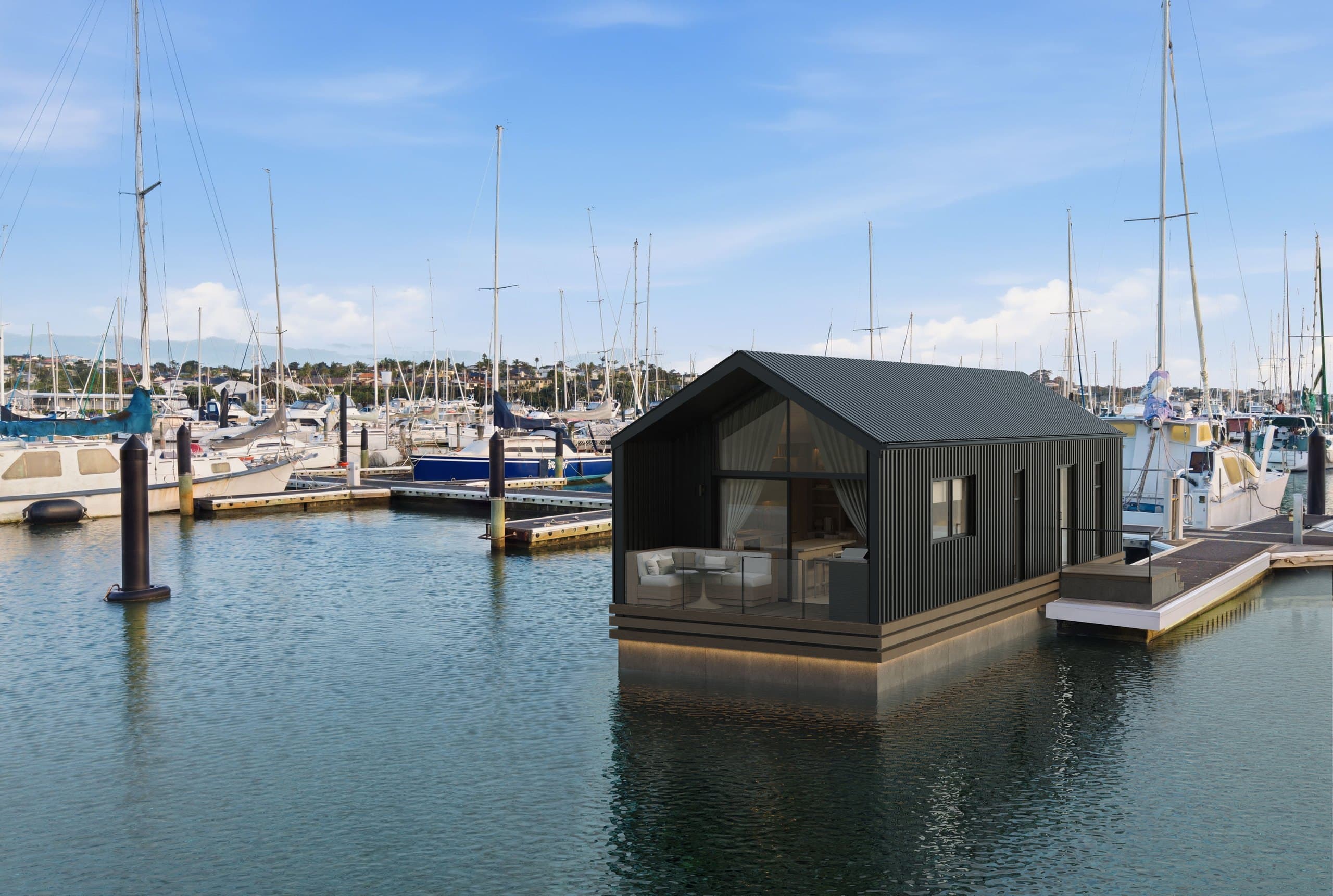 Photorealistic aerial render of a Boathouse Residence floating at Hobsonville Marina in Auckland by Render Works