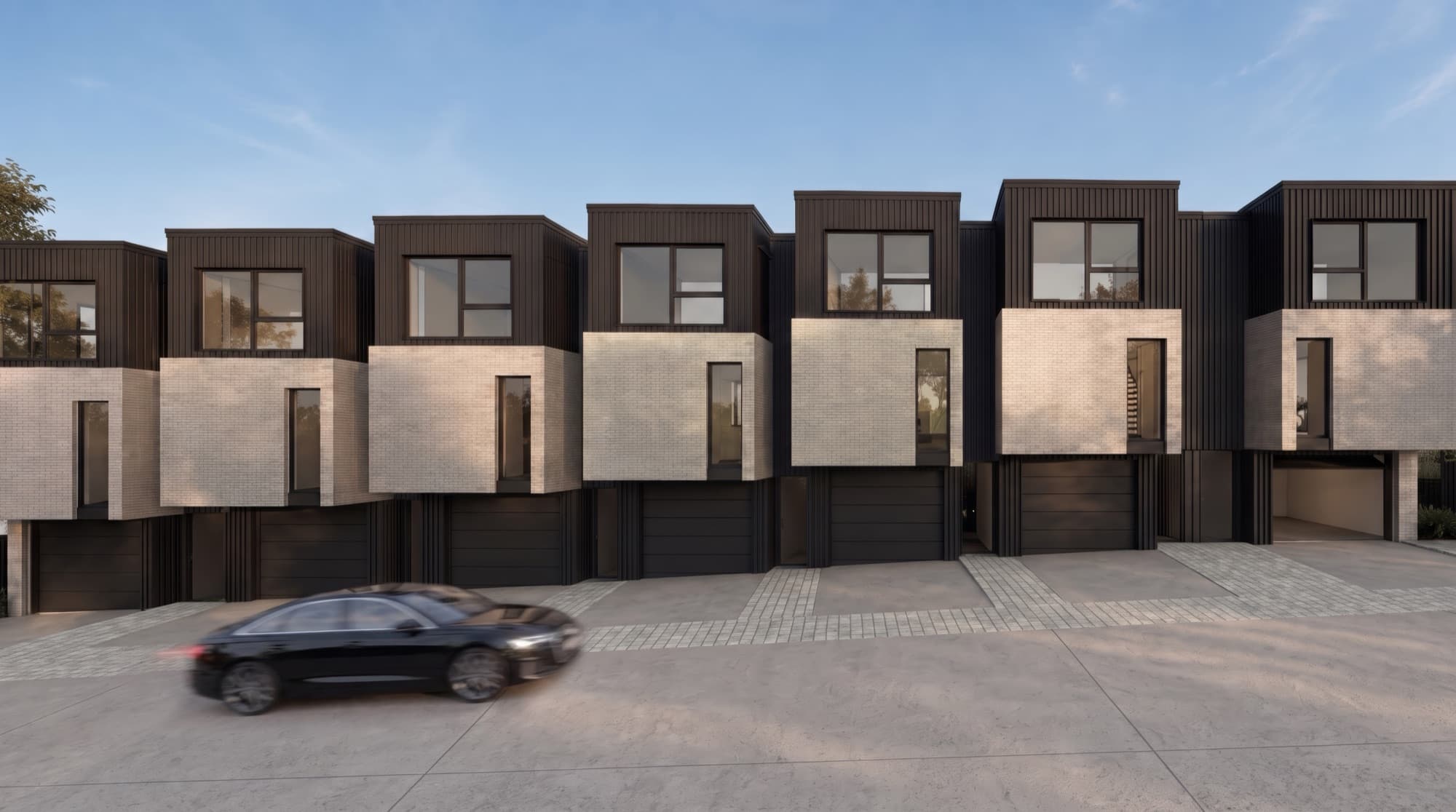 Exterior render of the brick and black-clad Ludlow Terrace townhouses in Tōtara Vale, Auckland